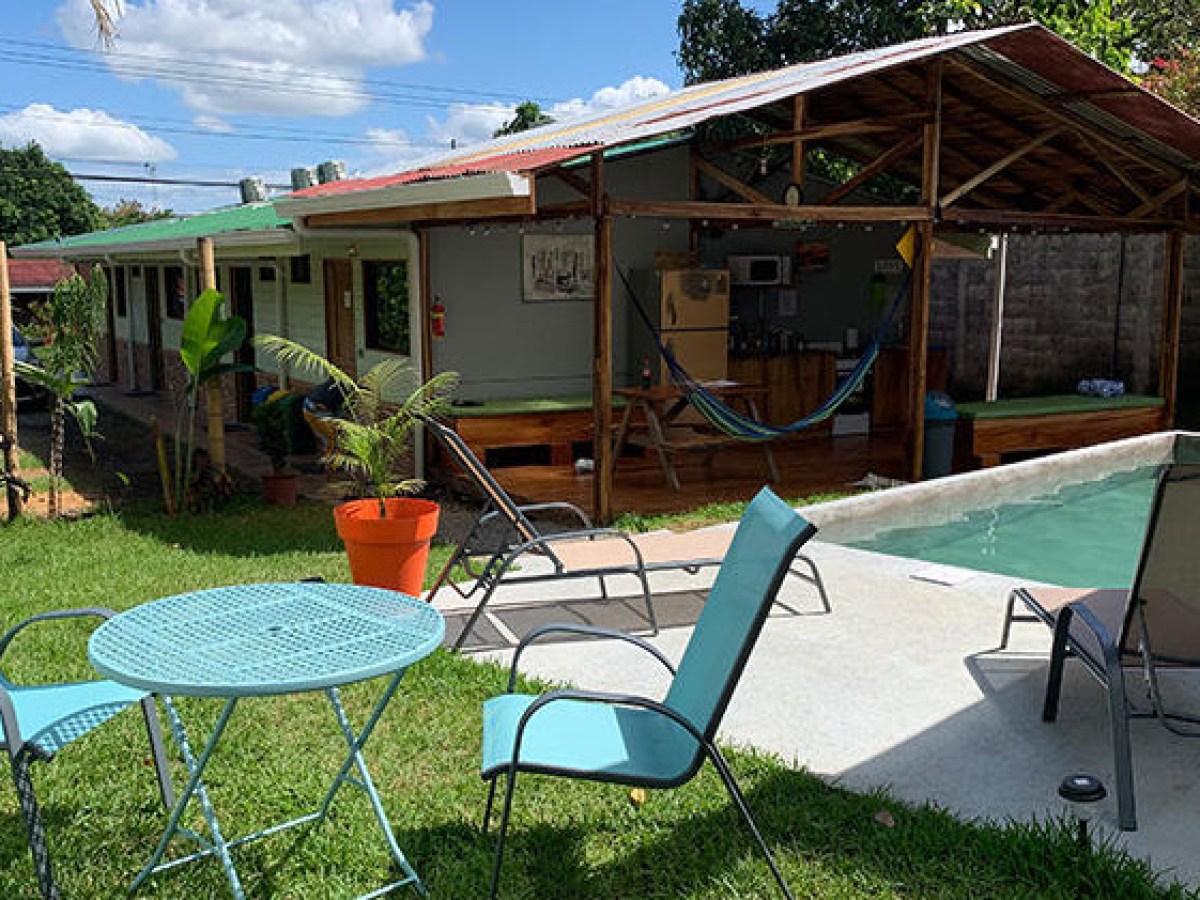 outdoor patio lounge chairs in sunny yard