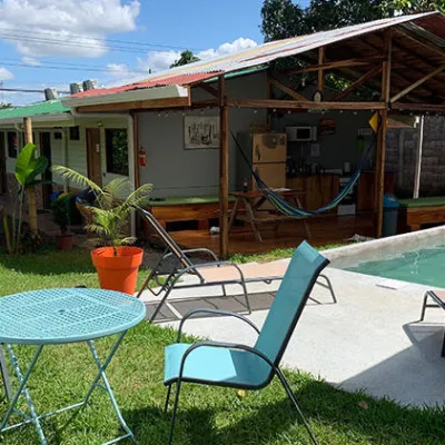 outdoor patio lounge chairs in sunny yard