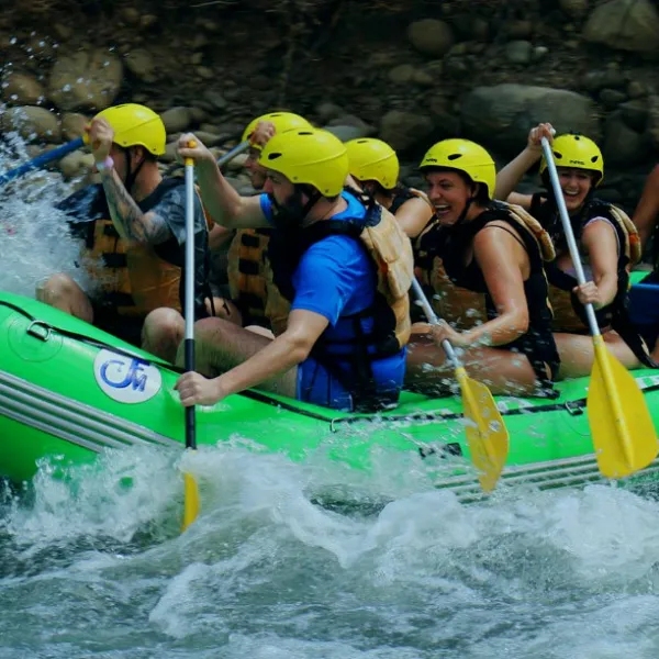 group of people white water rafting Toro River